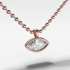 Bezel Set Pendant Beaded Necklace with East West Marquise Cut Diamond