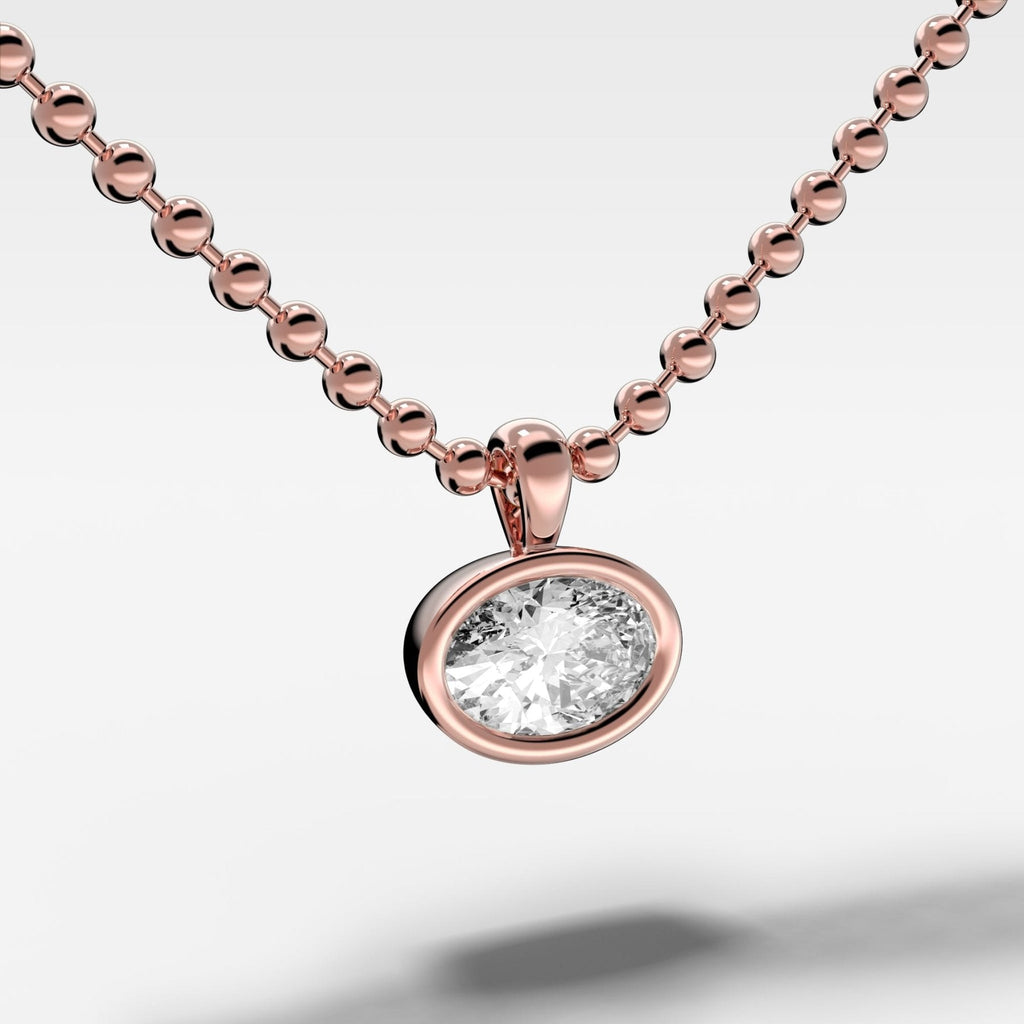 Bezel Set Pendant Beaded Necklace with East West Oval Cut Diamond