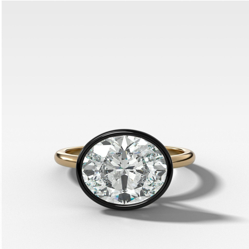 Blackened Penumbra Bezel Set Engagement Ring With East West Oval Cut