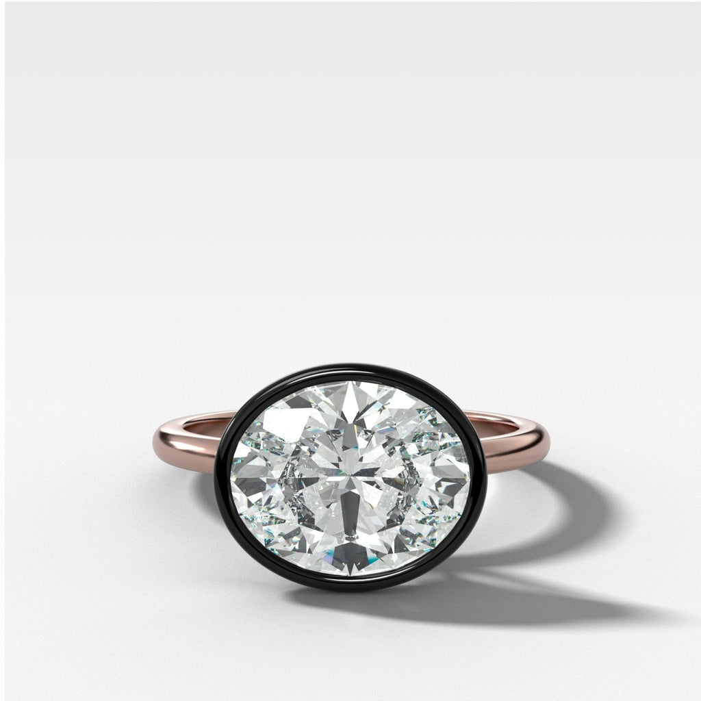 Blackened Penumbra Bezel Set Engagement Ring With East West Oval Cut
