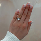 Blackened Three Stone Engagement Ring With Straight Baguette Side Stones and Emerald Cut Diamond