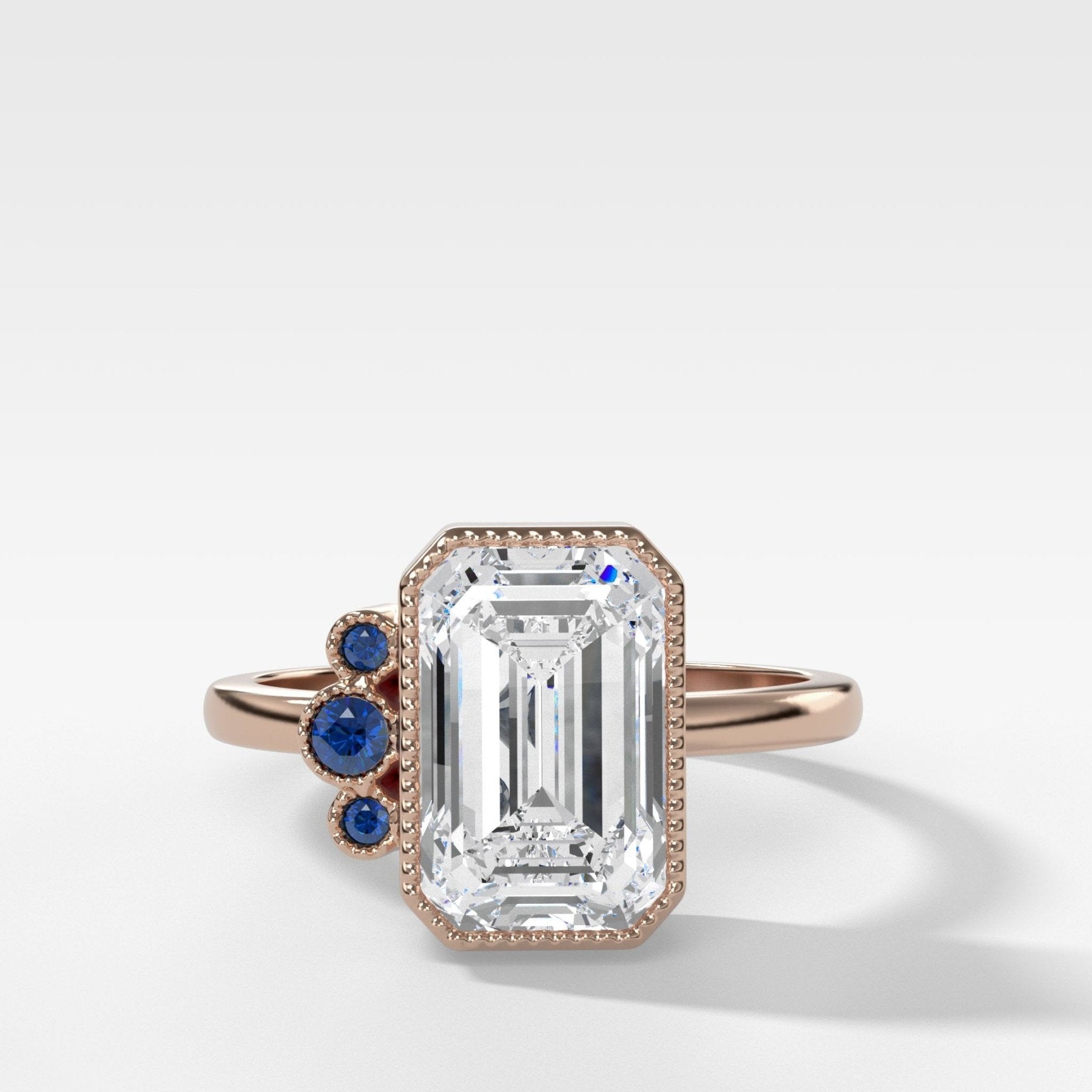 Blue Sapphire Cluster Engagement Ring With Emerald Cut