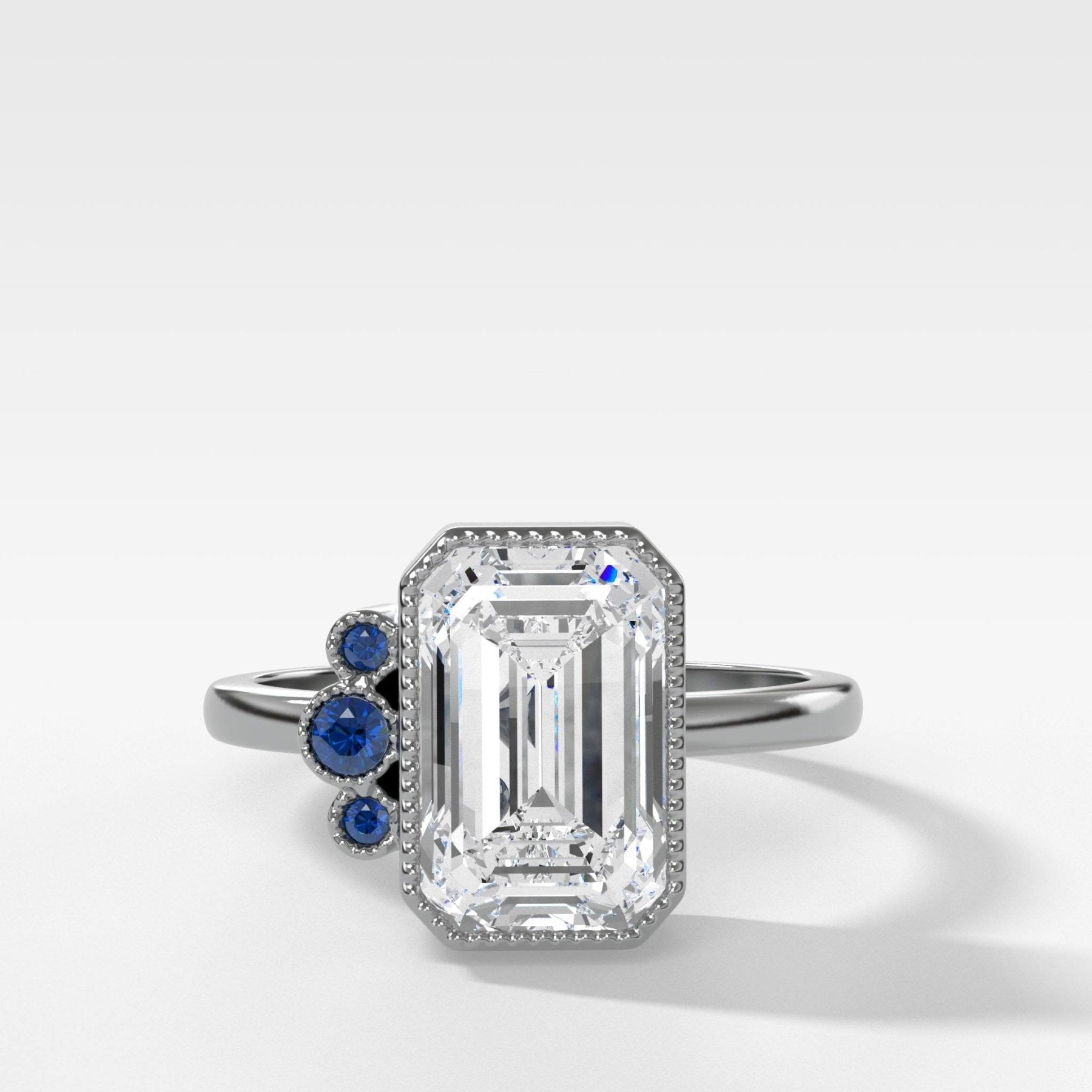 Blue Sapphire Cluster Engagement Ring With Emerald Cut