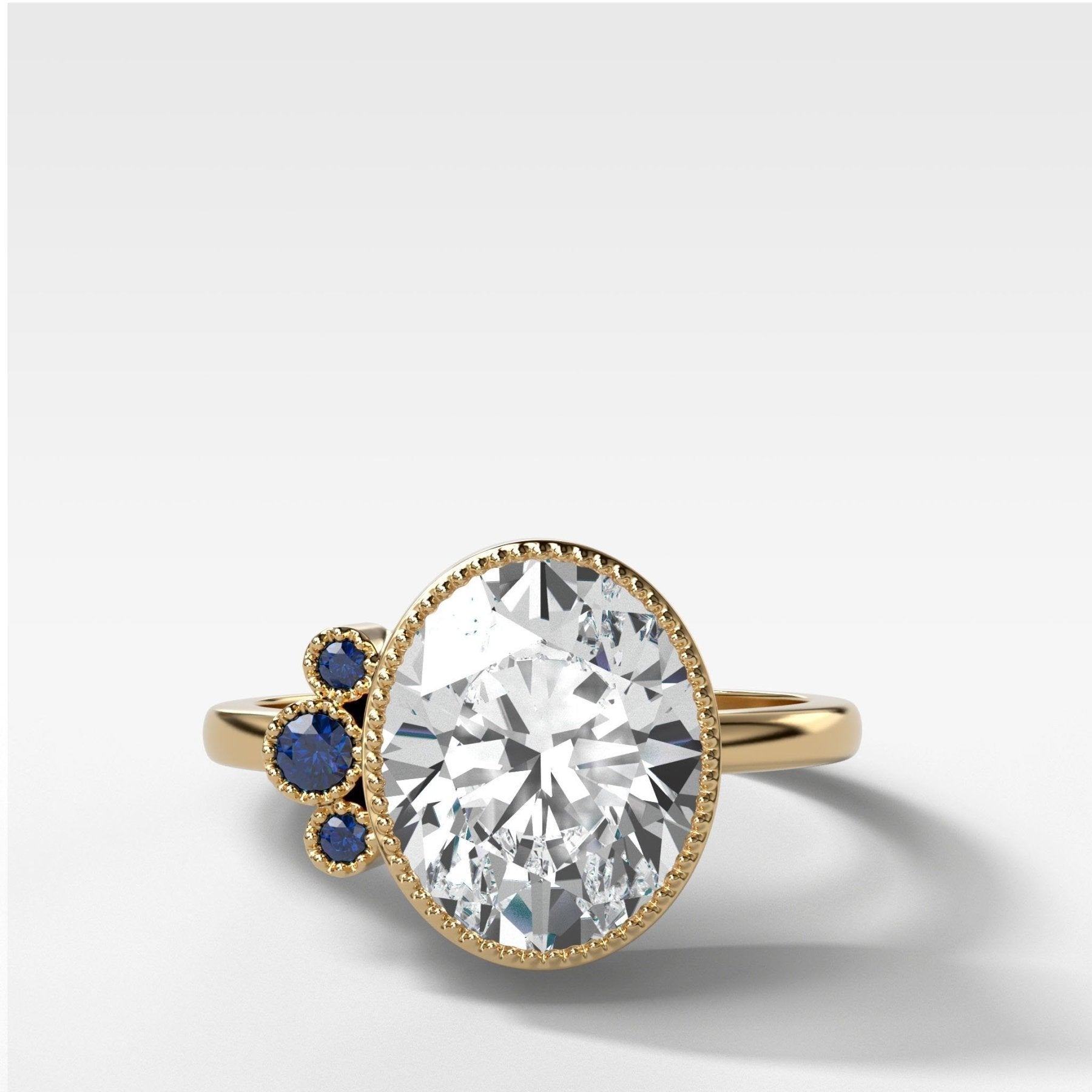Blue Sapphire Cluster Engagement Ring With Oval Cut
