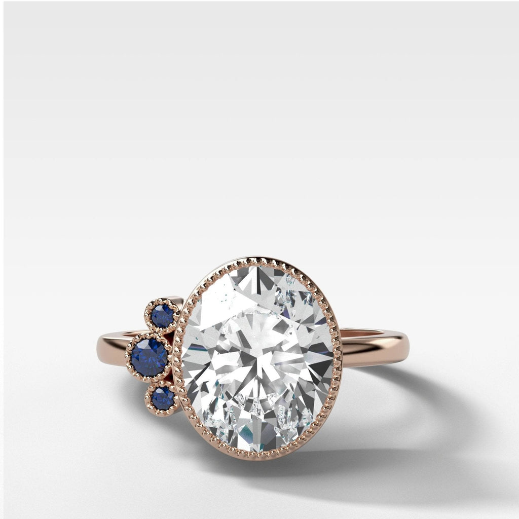 Blue Sapphire Cluster Engagement Ring With Oval Cut