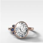 Blue Sapphire Cluster Engagement Ring With Oval Cut