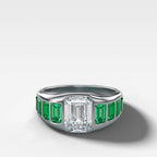 Brick Road Engagement Ring with Green Emeralds and an Emerald Cut