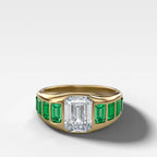 Brick Road Engagement Ring with Green Emeralds and an Emerald Cut