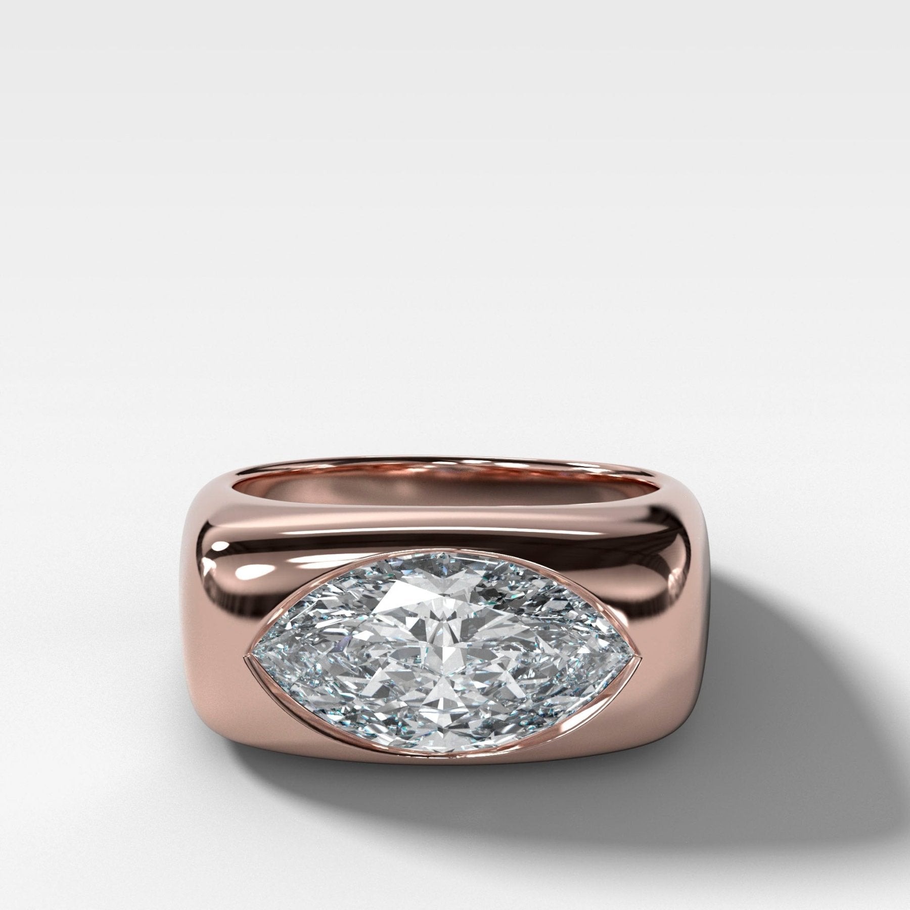 Burnished Solitaire Engagement Ring with Marquise Cut Diamond