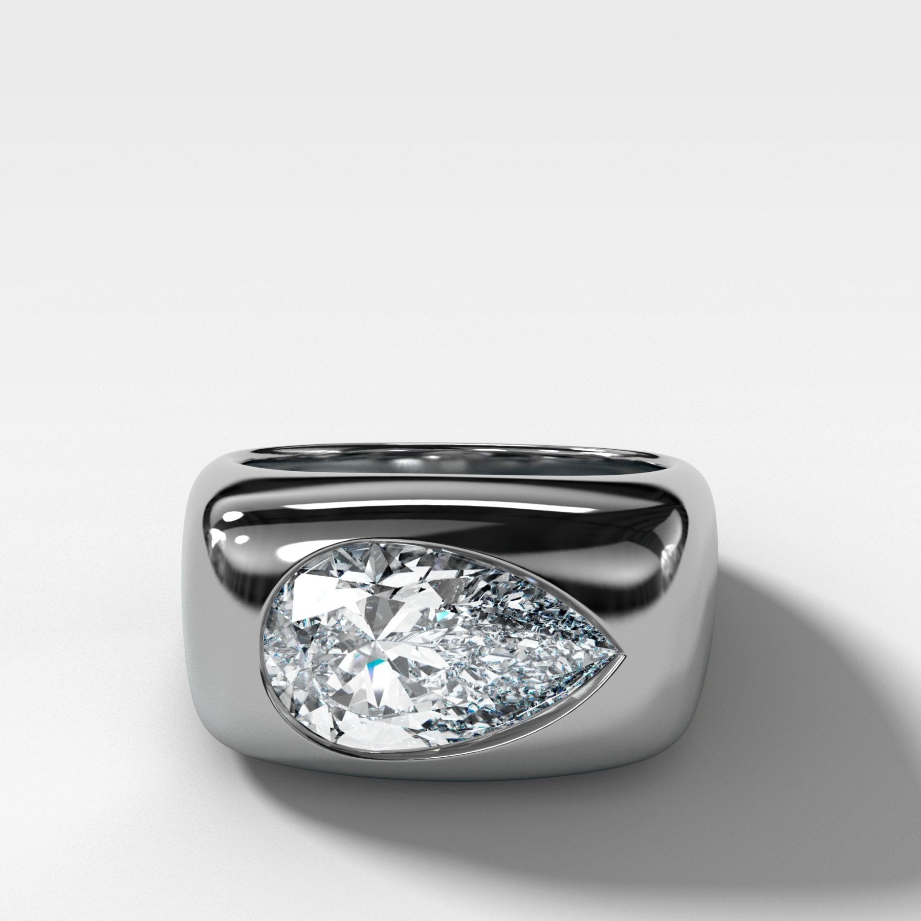 Burnished Solitaire Engagement Ring with Pear Cut Diamond