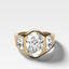 Burnished Three Stone Engagement Ring with Half Moon Sides & Oval Cut Diamond