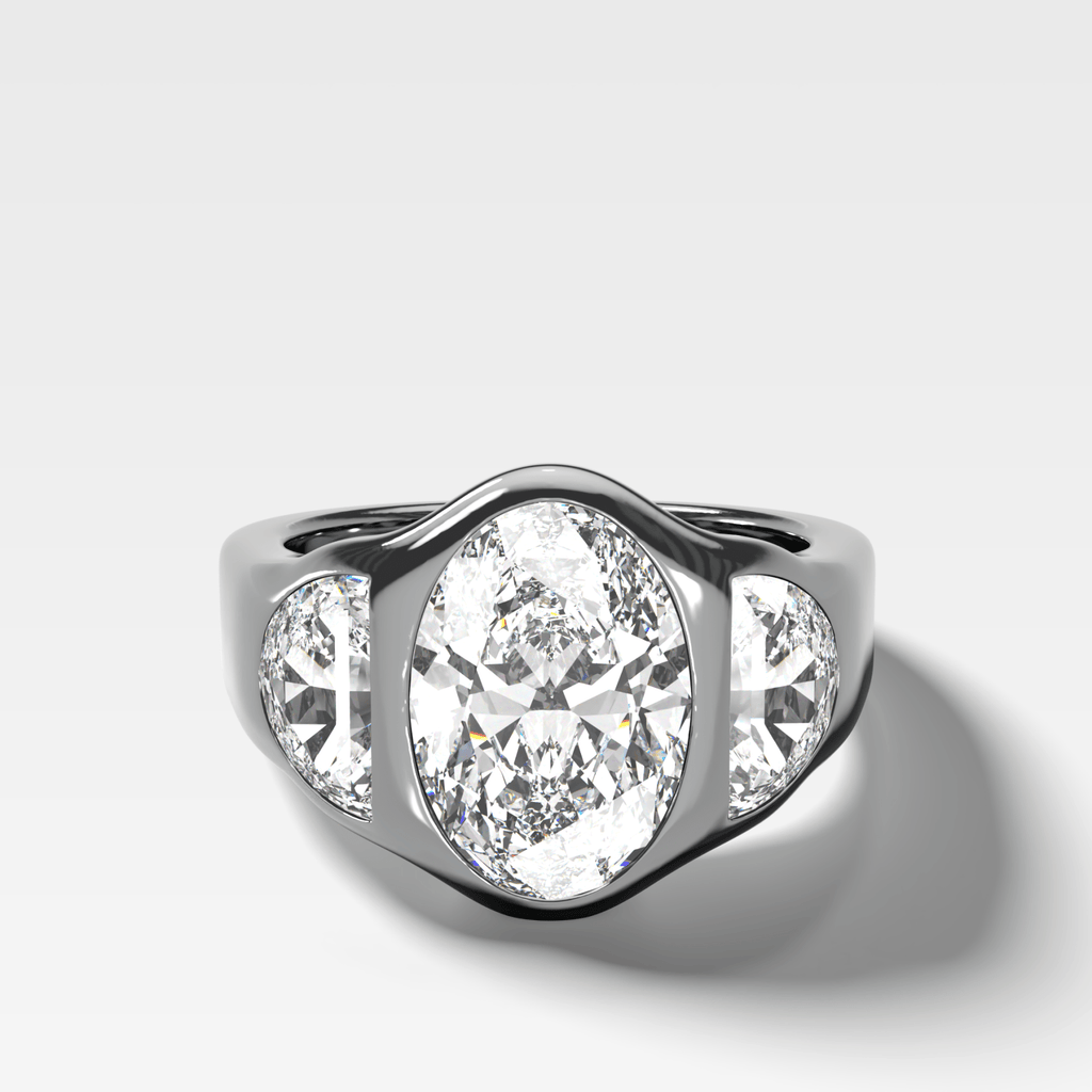 Burnished Three Stone Engagement Ring with Half Moon Sides & Oval Cut Diamond