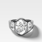 Burnished Three Stone Engagement Ring with Half Moon Sides & Oval Cut Diamond