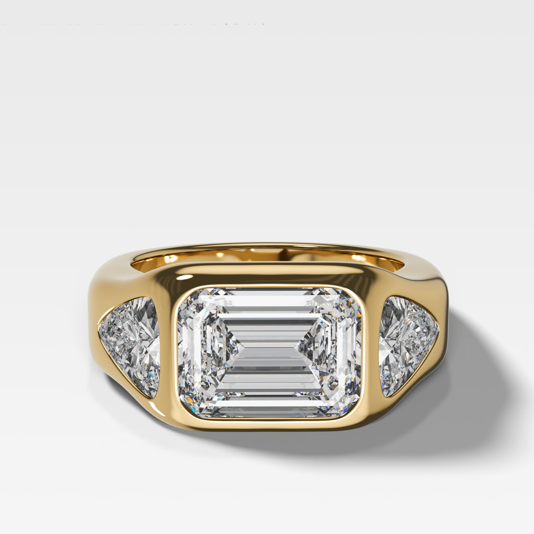Burnished Three Stone Engagement Ring with Trilliant Sides and East West 2.53ct  Lab Grown Emerald Cut Diamond