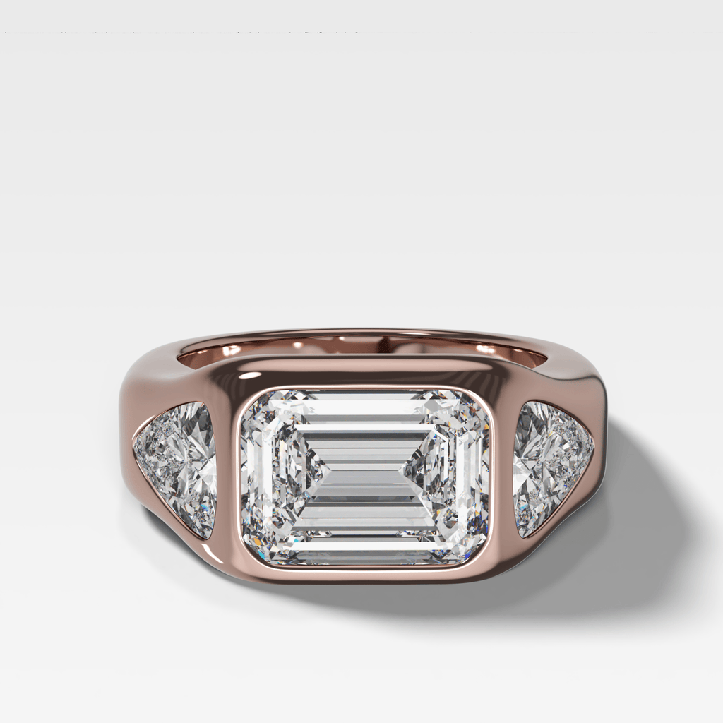 Burnished Three Stone Engagement Ring with Trilliant Sides and East West Emerald Cut Diamond