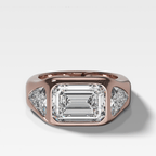 Burnished Three Stone Engagement Ring with Trilliant Sides and East West Emerald Cut Diamond