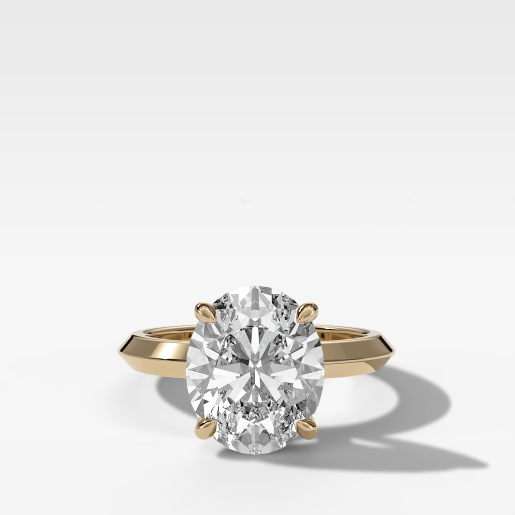 Butter Knife Solitaire Engagement Ring With Oval Cut Diamond