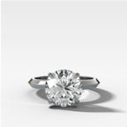 Butter Knife Solitaire Engagement Ring With Round Cut Diamond