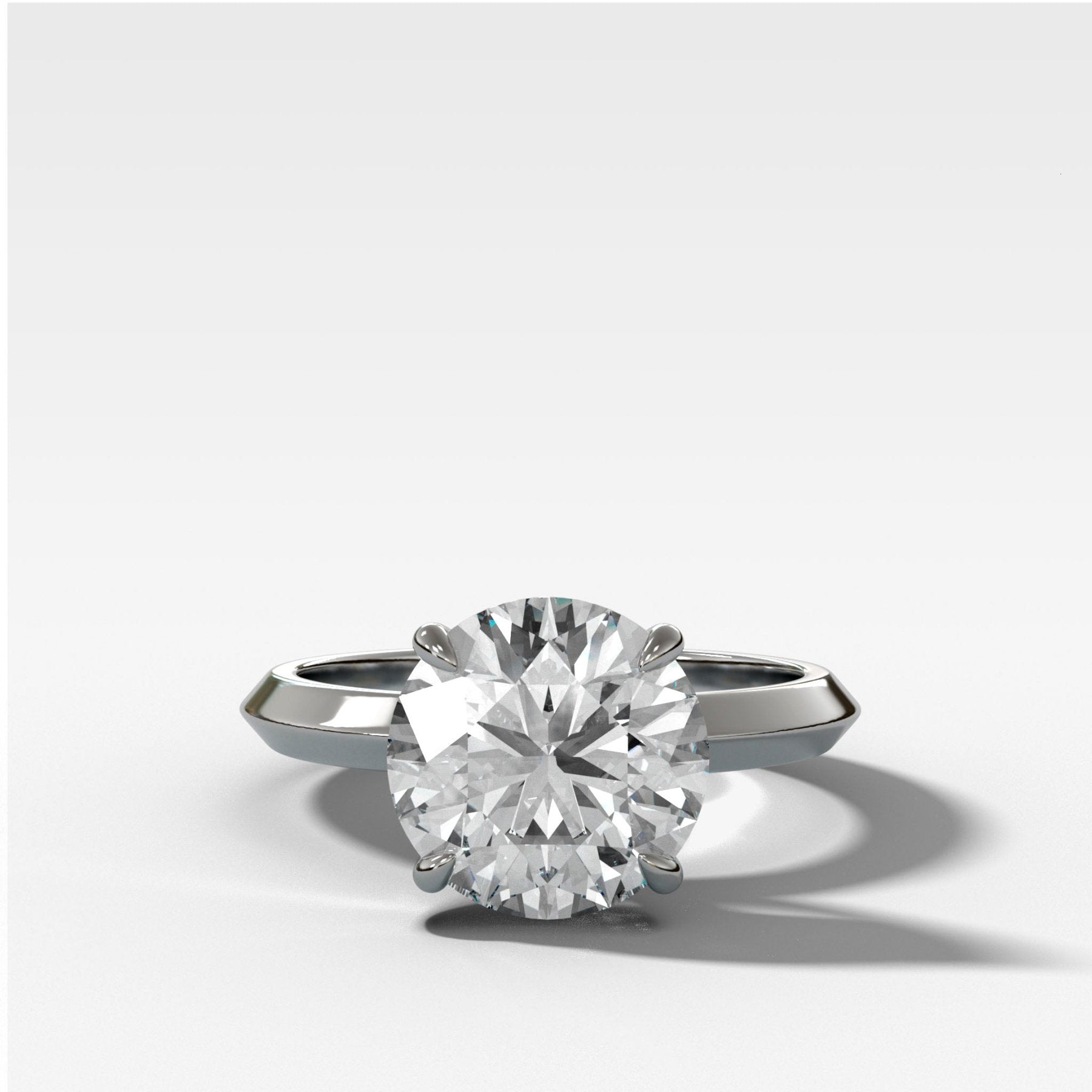 Butter Knife Solitaire Engagement Ring With Round Cut Diamond