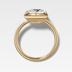 Button Back Solitaire Engagement Ring With a Princess Cut Diamond