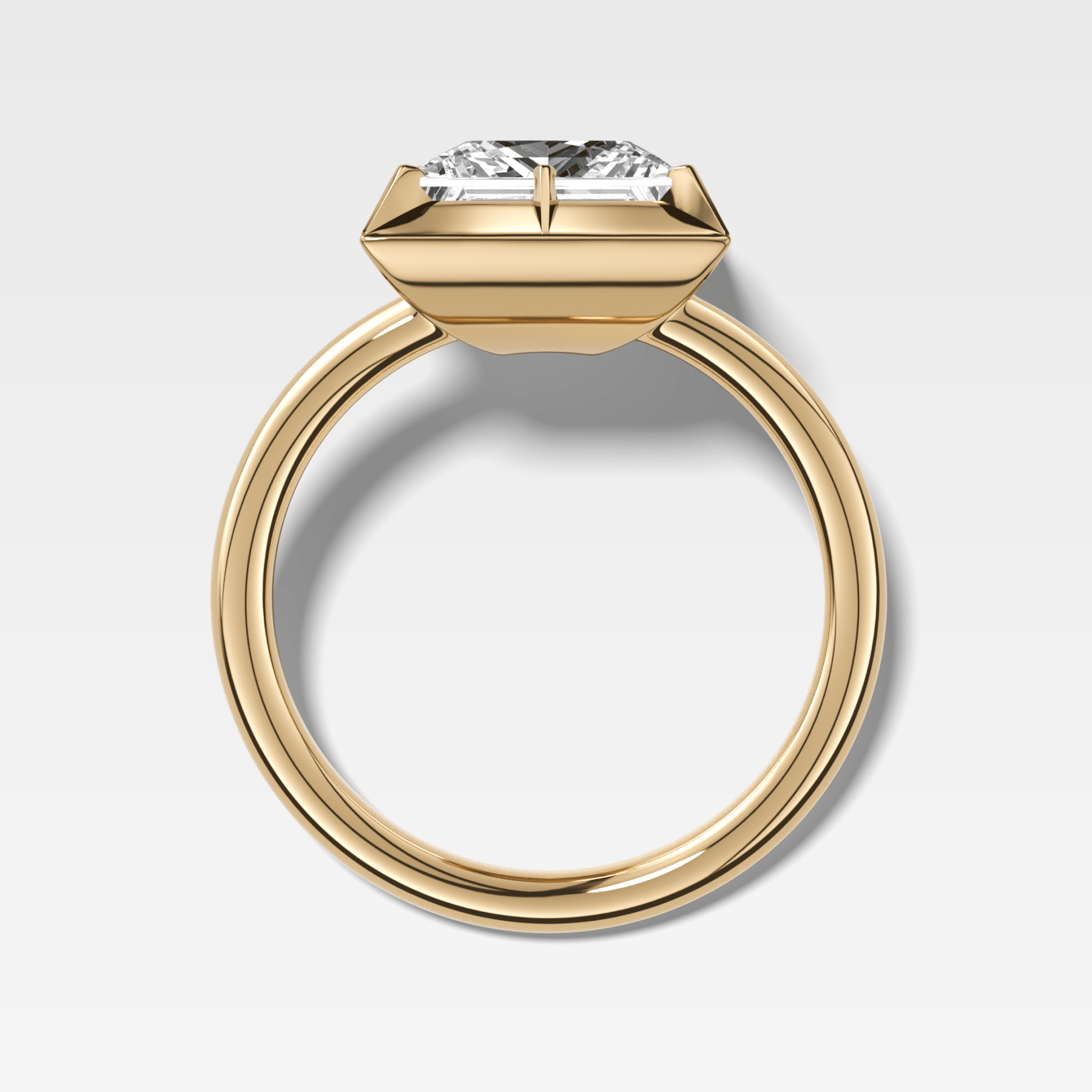 Button Back Solitaire Engagement Ring With a Princess Cut Diamond