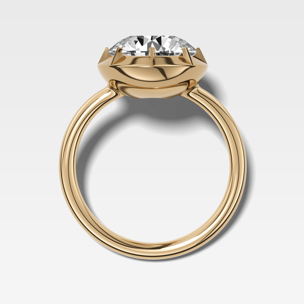 Button Back Solitaire Engagement Ring With a Round Cut Diamond