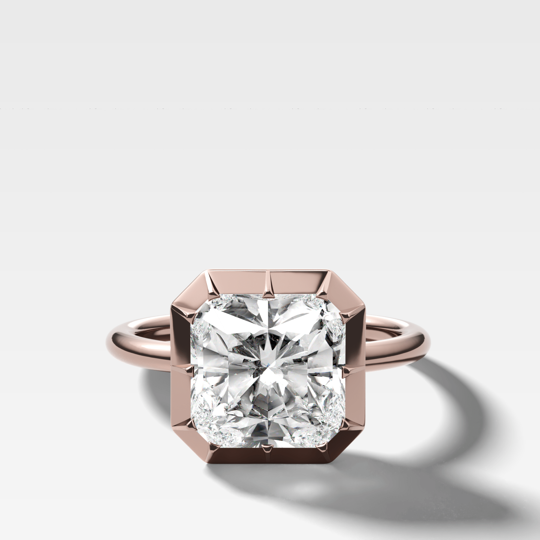 Button Back Solitaire Engagement Ring With a Square Radiant Cut Diamond