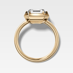 Button Back Solitaire Engagement Ring With an Asscher Cut Diamond