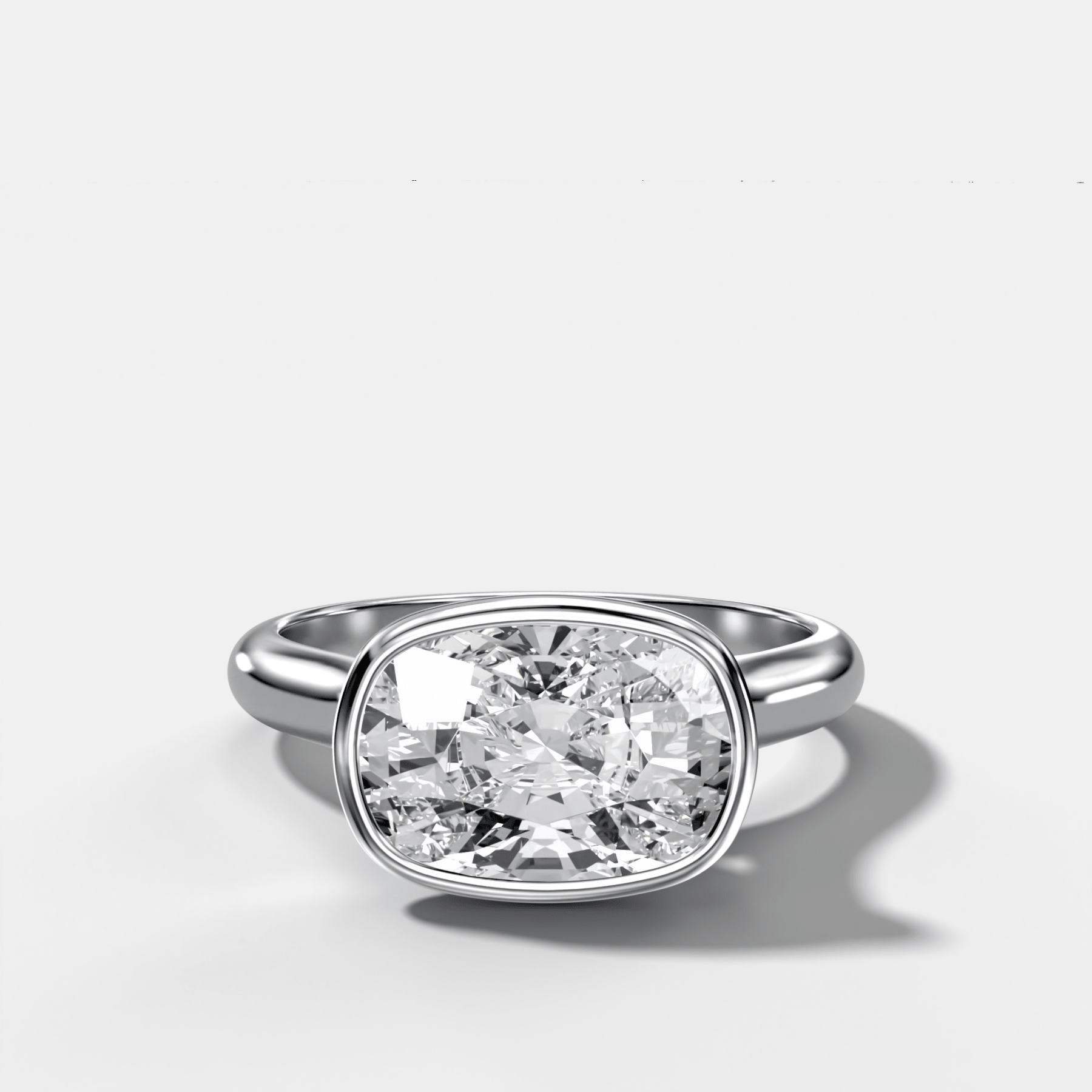 Cathedral Bezel Set Solitaire Engagement Ring With Elongated Cushion Diamond (East West)