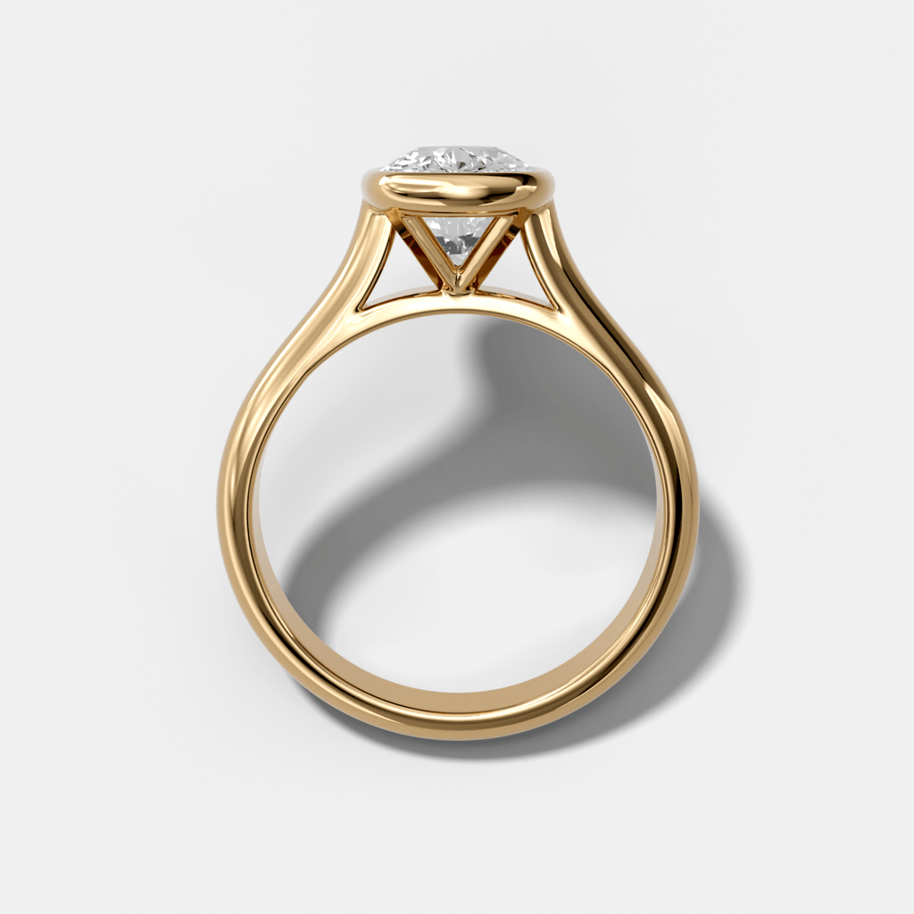 Cathedral Bezel Set Solitaire Engagement Ring With Elongated Cushion Diamond