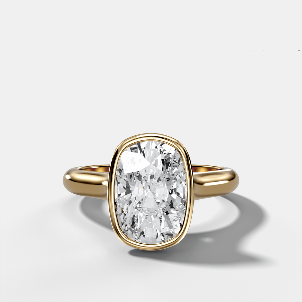 Cathedral Bezel Set Solitaire Engagement Ring With Elongated Cushion Diamond
