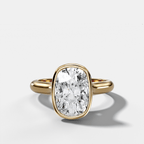 Cathedral Bezel Set Solitaire Engagement Ring With Elongated Cushion Diamond