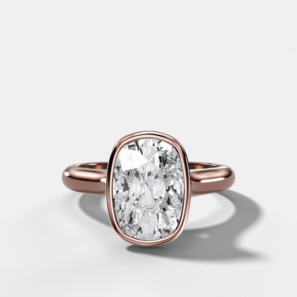 Cathedral Bezel Set Solitaire Engagement Ring With Elongated Cushion Diamond