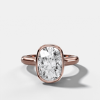 Cathedral Bezel Set Solitaire Engagement Ring With Elongated Cushion Diamond