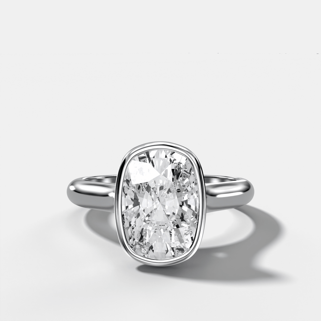 Cathedral Bezel Set Solitaire Engagement Ring With Elongated Cushion Diamond