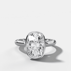 Cathedral Bezel Set Solitaire Engagement Ring With Elongated Cushion Diamond