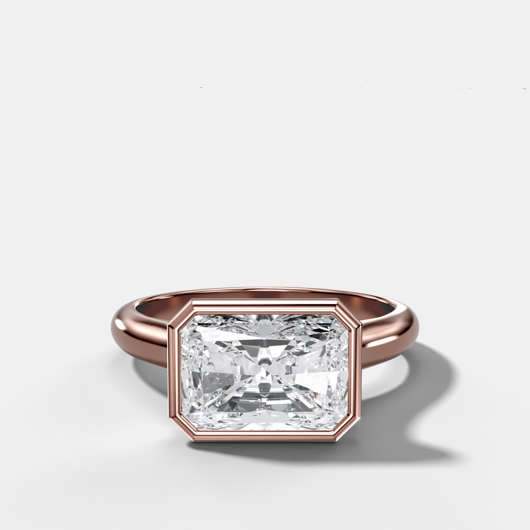 Cathedral Bezel Set Solitaire Engagement Ring With Elongated Radiant Diamond (East West)