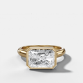 Cathedral Bezel Set Solitaire Engagement Ring With Elongated Radiant Diamond (East West)