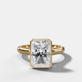 Cathedral Bezel Set Solitaire Engagement Ring With Elongated Radiant Diamond