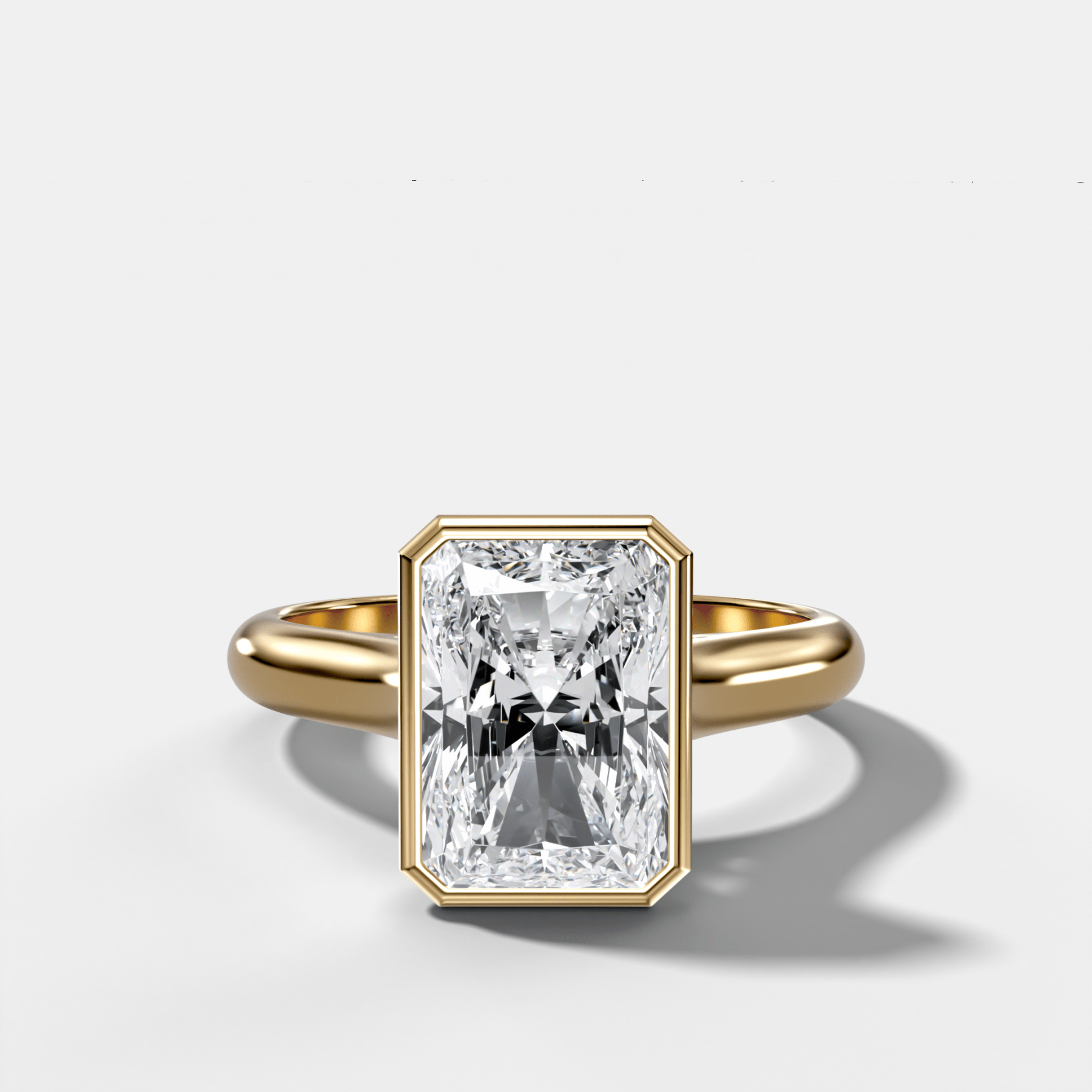 Cathedral Bezel Set Solitaire Engagement Ring With Elongated Radiant Diamond