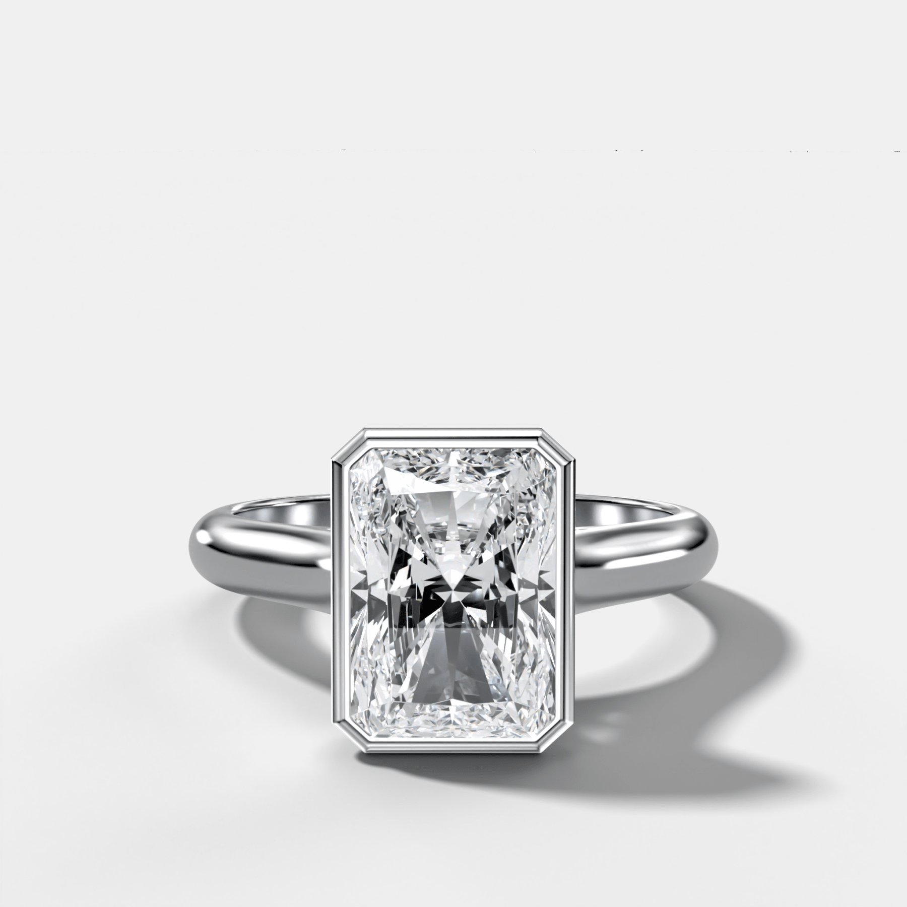 Cathedral Bezel Set Solitaire Engagement Ring With Elongated Radiant Diamond