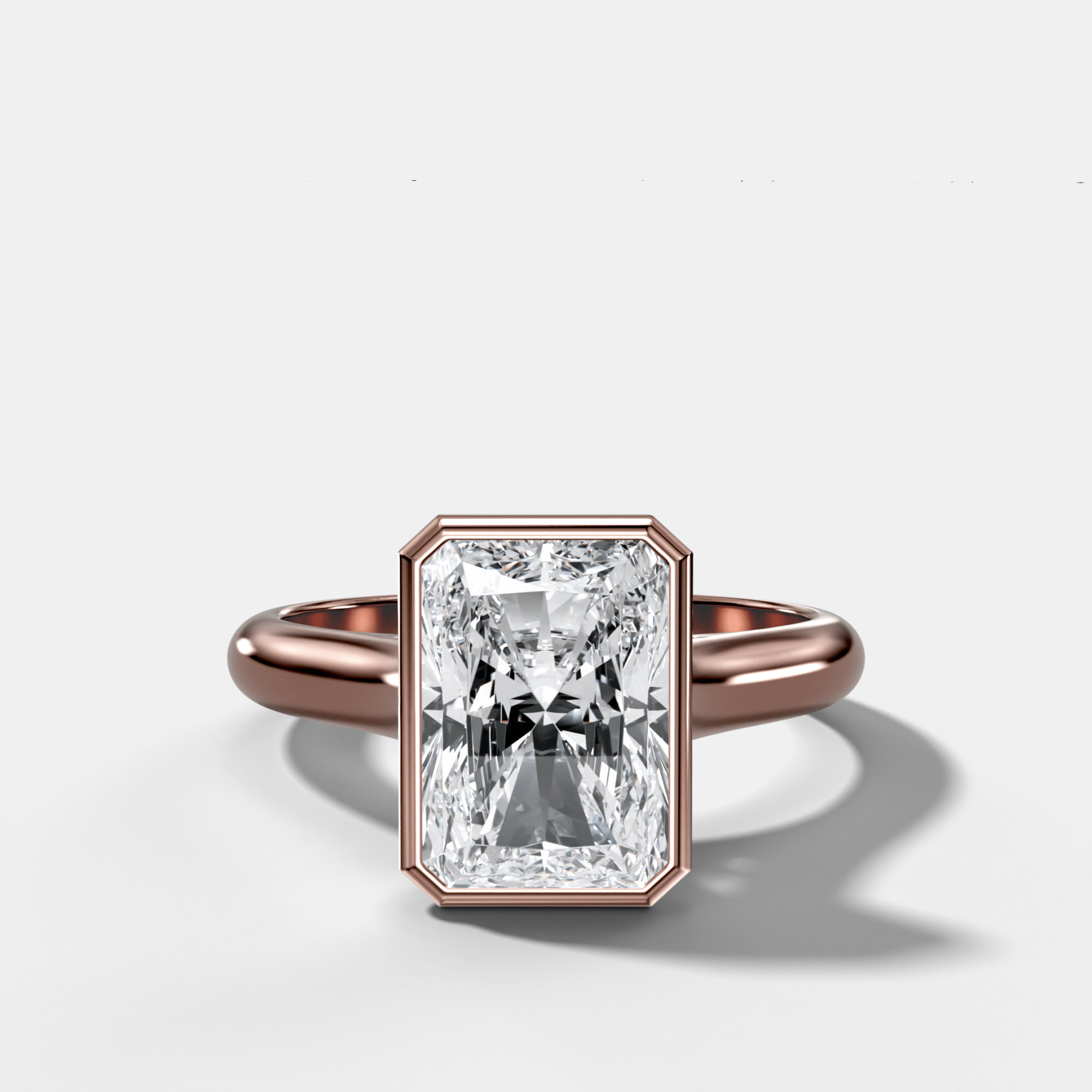 Cathedral Bezel Set Solitaire Engagement Ring With Elongated Radiant Diamond
