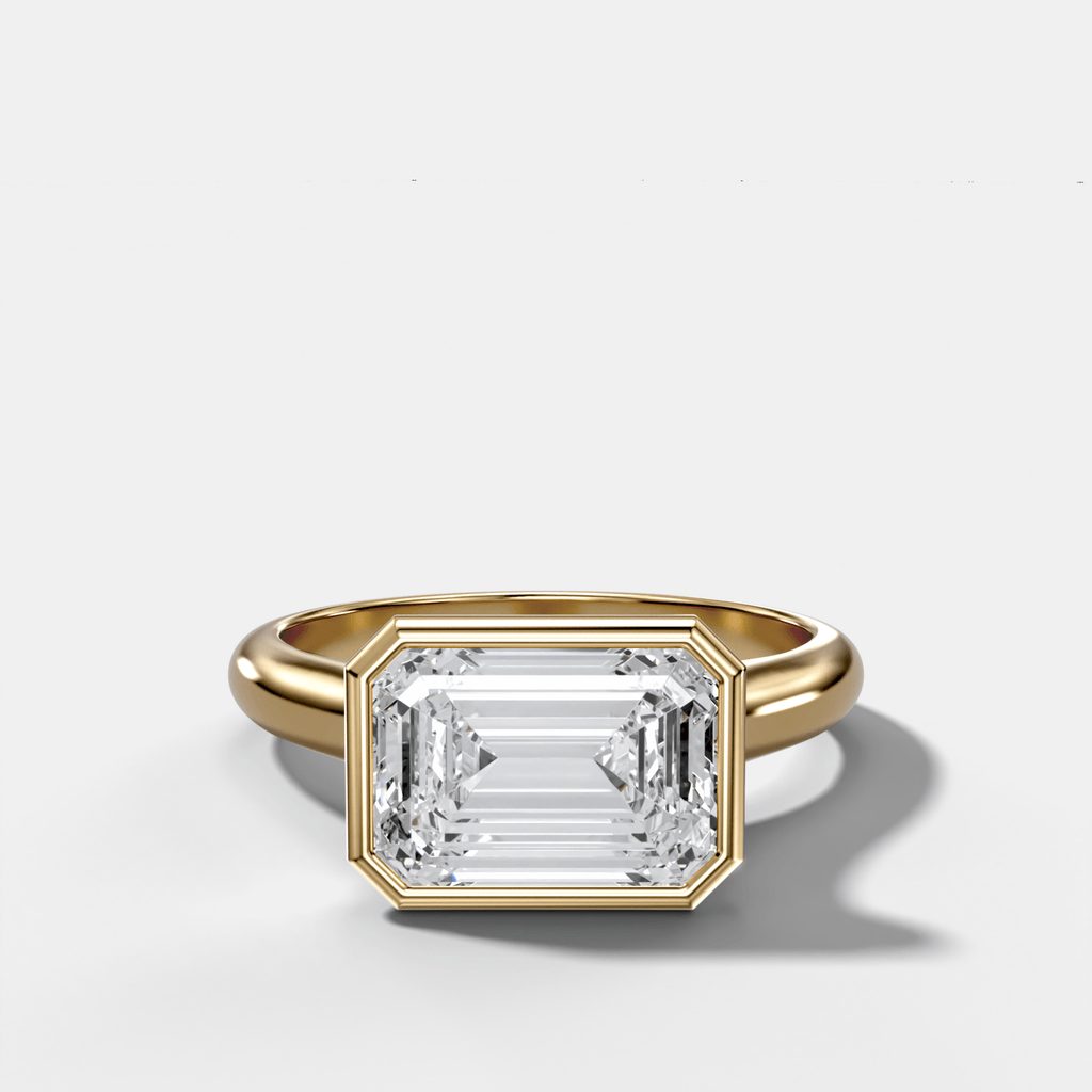 Cathedral Bezel Set Solitaire Engagement Ring With Emerald Cut Diamond (East West)
