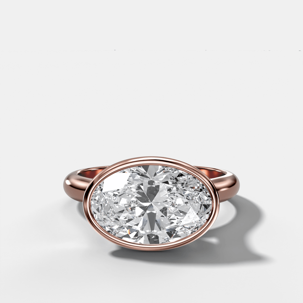 Cathedral Bezel Set Solitaire Engagement Ring With Oval Diamond (East West)