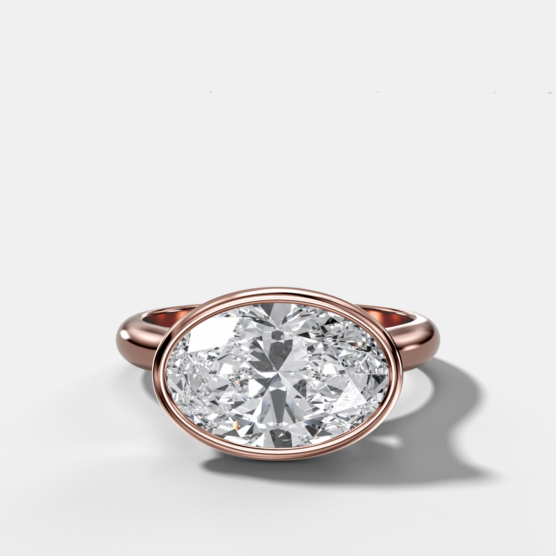 Cathedral Bezel Set Solitaire Engagement Ring With Oval Diamond (East West)