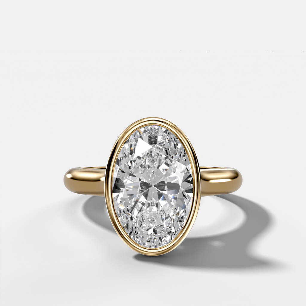 Cathedral Bezel Set Solitaire Engagement Ring With Oval Diamond