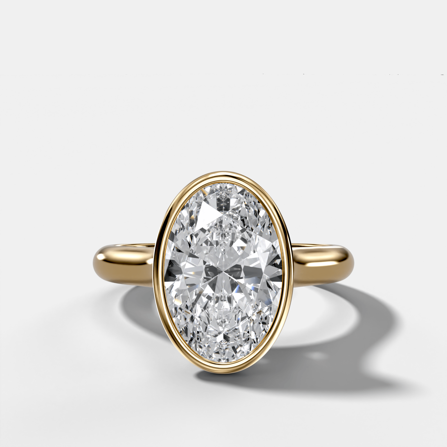 Cathedral Bezel Set Solitaire Engagement Ring With Oval Diamond