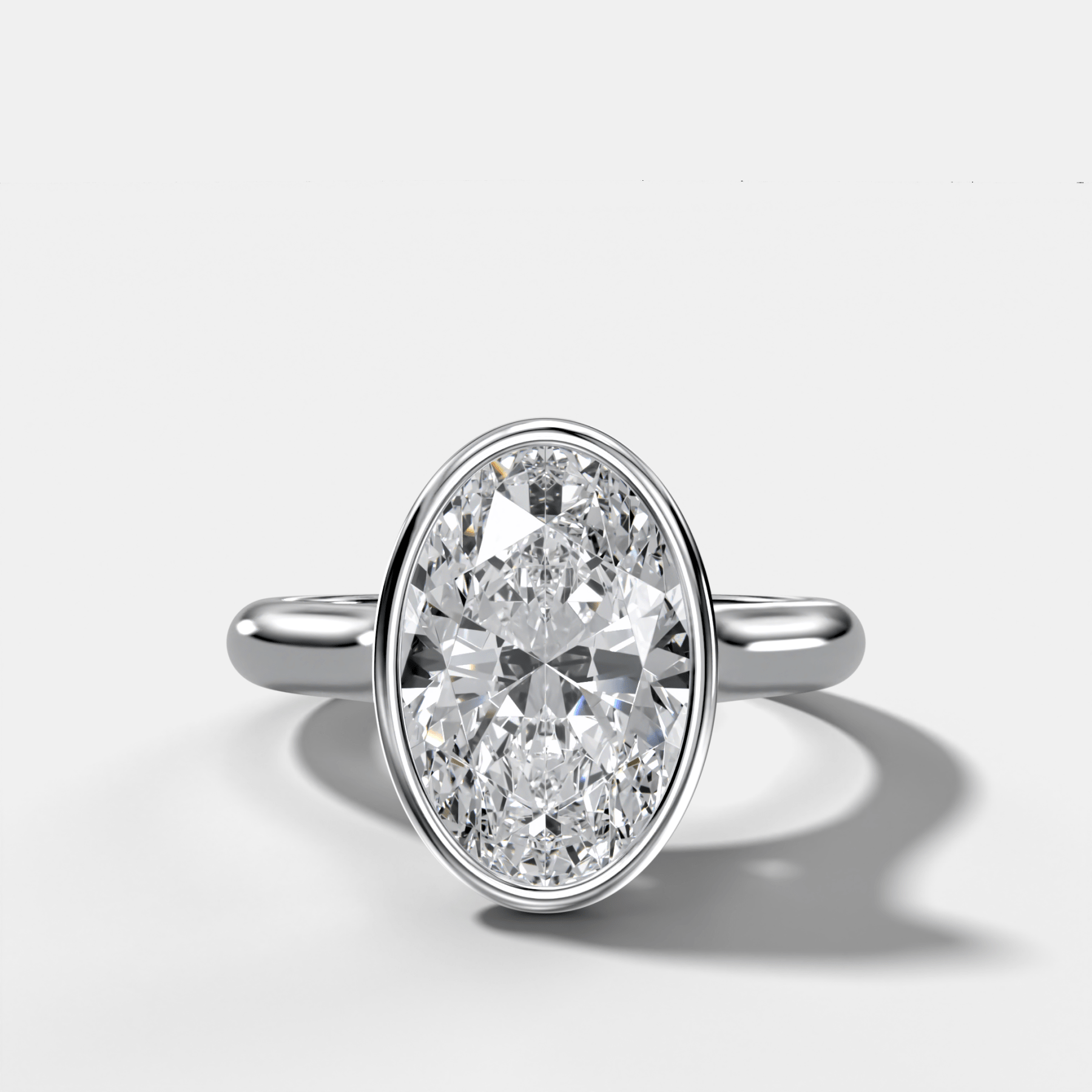 Cathedral Bezel Set Solitaire Engagement Ring With Oval Diamond