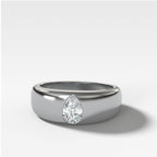 Chunky Burnished Ring with a Pear Cut