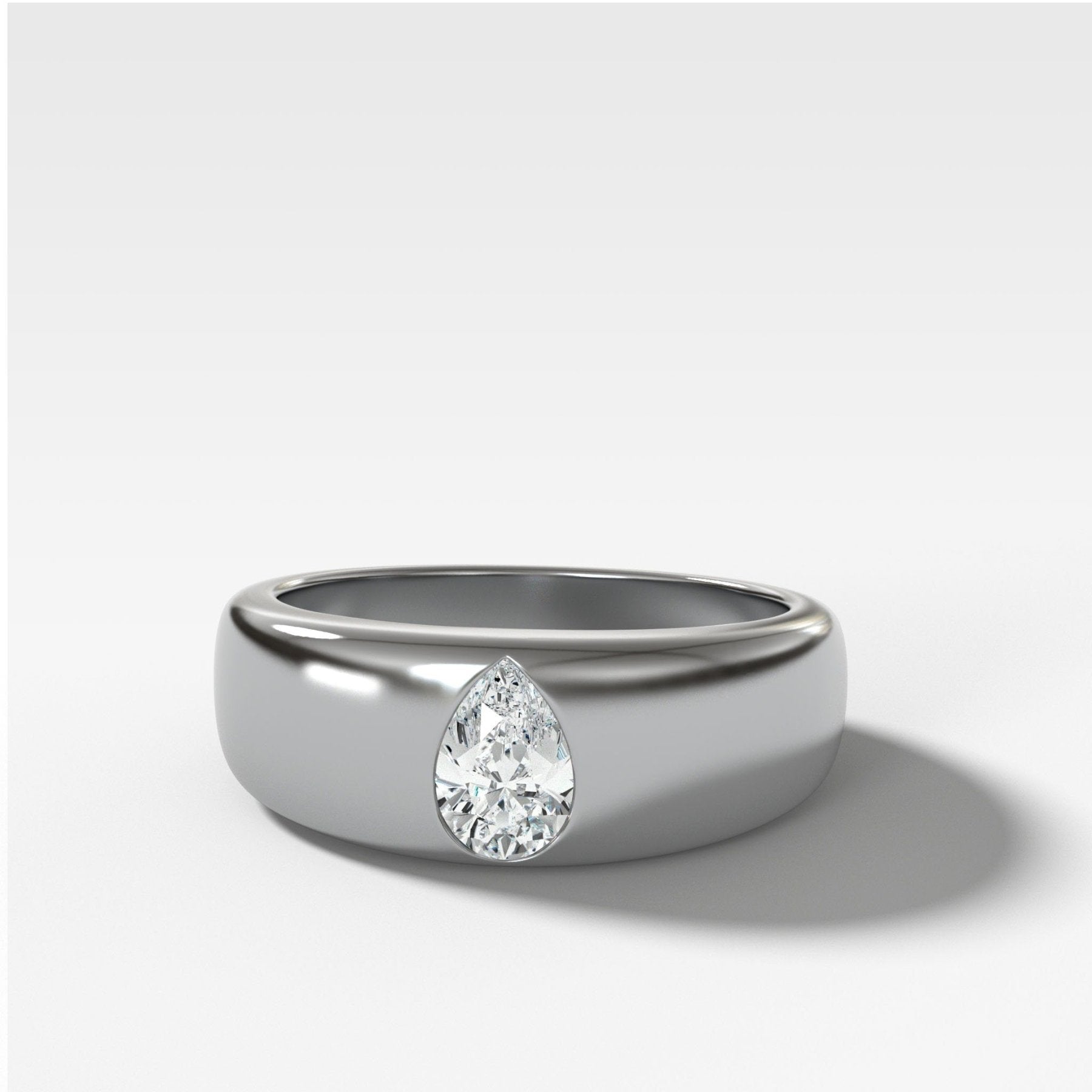 Chunky Burnished Ring with a Pear Cut